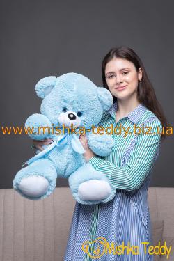 Маленький голубой плюшевый мишка Томас